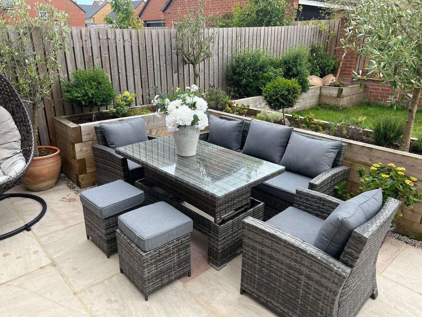 Antonio Grey Rattan Sofa Armchair and Rising Table Dining Set