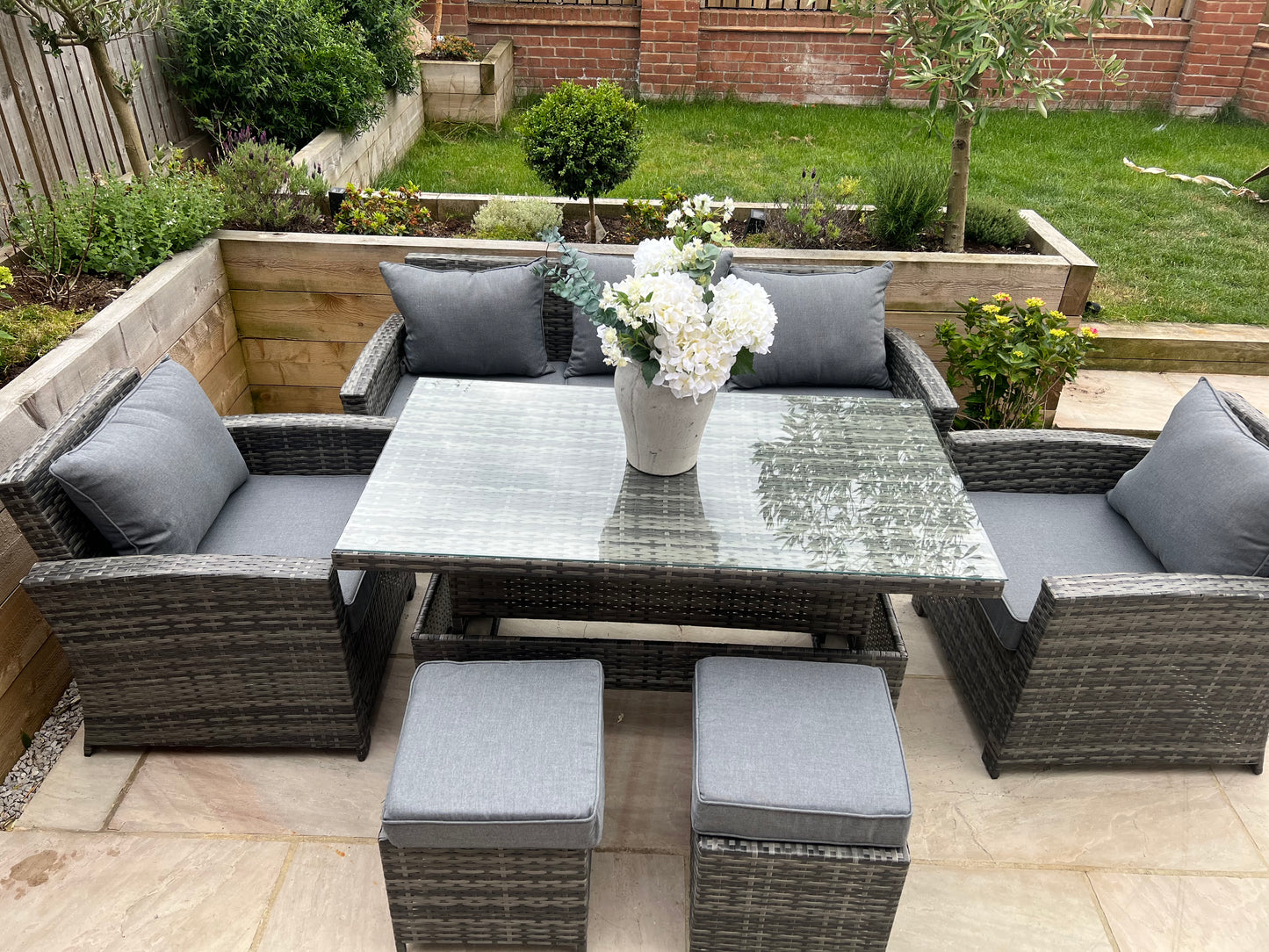 Antonio Grey Rattan Sofa Armchair and Rising Table Dining Set