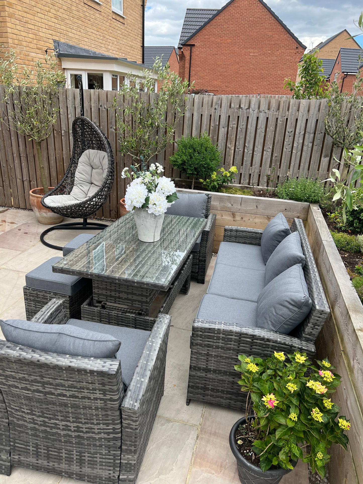 Antonio Grey Rattan Sofa Armchair and Rising Table Dining Set