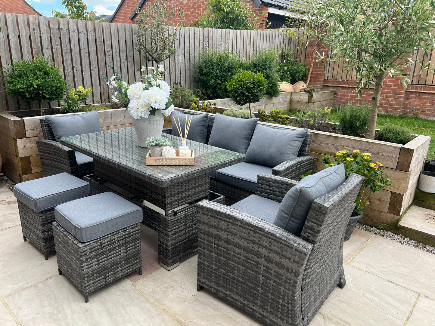 Antonio Grey Rattan Sofa Armchair and Rising Table Dining Set